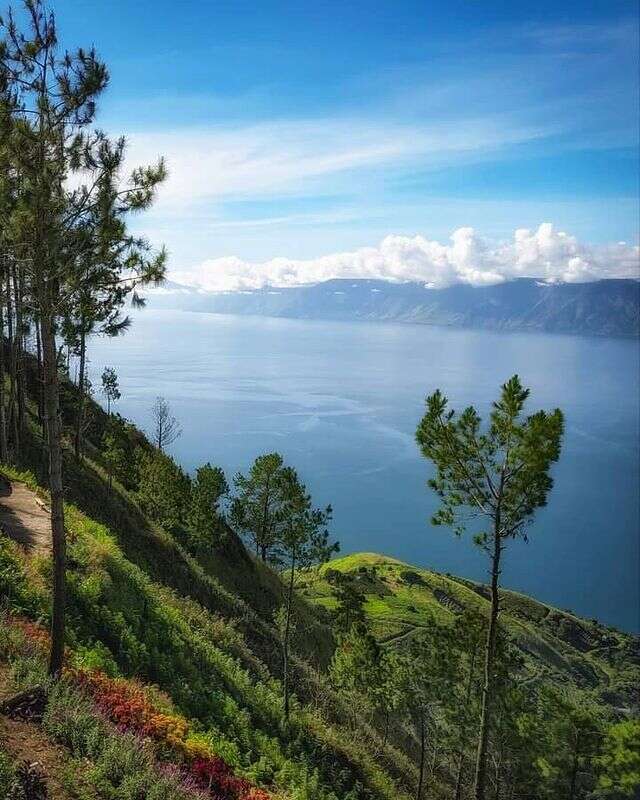 tempat destinasi wisata populer di Indonesia yang mendunia wajib di kunjungi danau toba foto copyright instagram @imamdower